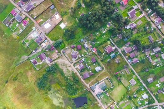Top view of the village, fields and forests near the village