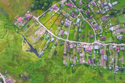 Top view of the village, fields and forests near the village