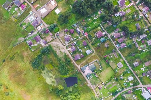 Top view of the village, fields and forests near the village
