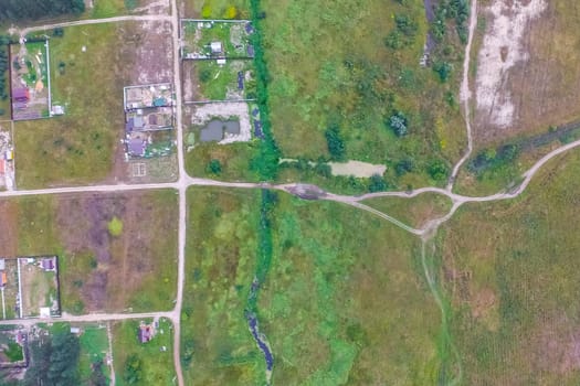 Top view of the village, fields and forests near the village