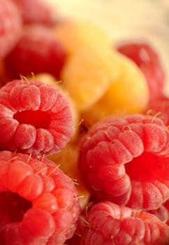 Two-color ripe garden raspberry close-up selective focus.Macro photography.Texture or background.Selective focus.
