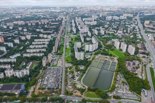 Top view of the city of Moscow, buildings and roads and other infrastructure of the city. Cityscape view from above.