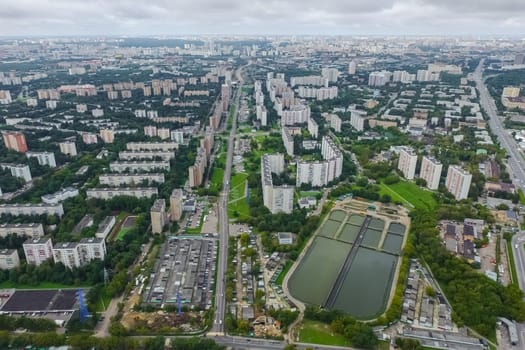 Top view of the city of Moscow, buildings and roads and other infrastructure of the city. Cityscape view from above.