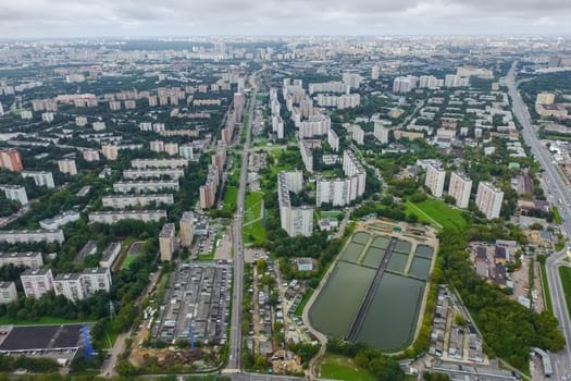 Top view of the city of Moscow, buildings and roads and other infrastructure of the city. Cityscape view from above.