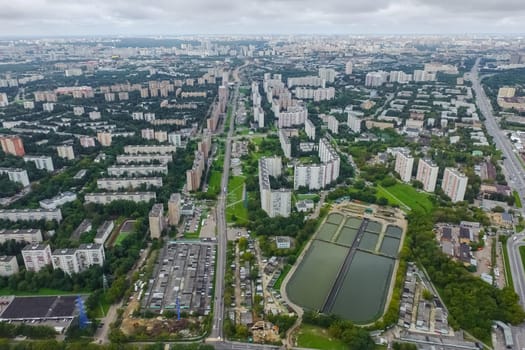 Top view of the city of Moscow, buildings and roads and other infrastructure of the city. Cityscape view from above.