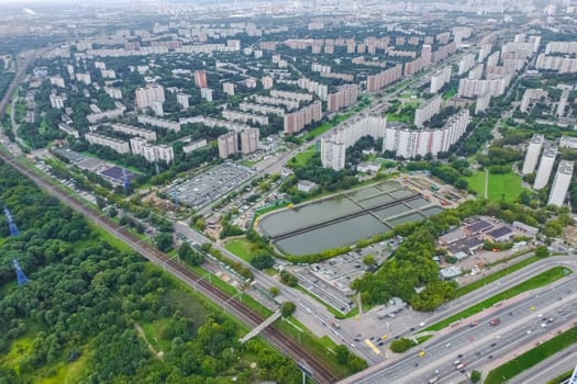Top view of the city of Moscow, buildings and roads and other infrastructure of the city. Cityscape view from above.