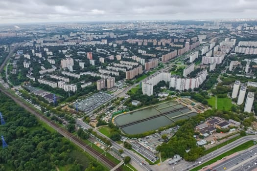 Top view of the city of Moscow, buildings and roads and other infrastructure of the city. Cityscape view from above.