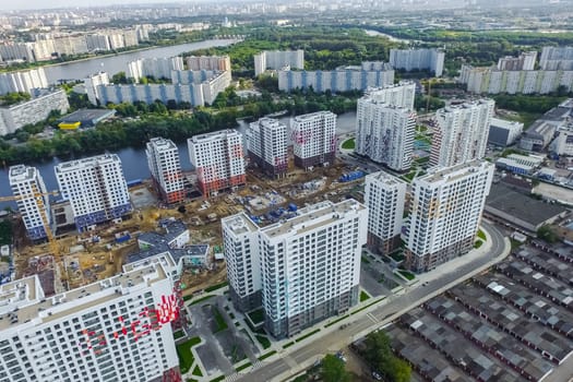 Top view of the city of Moscow, buildings and roads and other infrastructure of the city. Cityscape view from above.