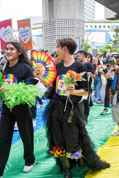 Bangkok, Thailand - JUN 1, 2024 Bangkok Pride Festival 2024, The short action and atmosphere of people joins celebrations in the event in Siam Square Bangkok, Thailand. Gender diversity There is no division of age, race or religion.