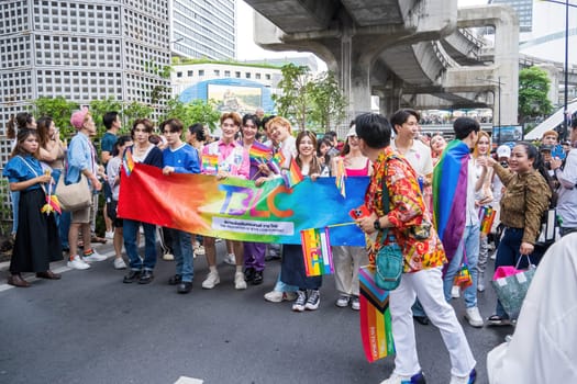 Bangkok, Thailand - JUN 1, 2024 Bangkok Pride Festival 2024, The short action and atmosphere of people joins celebrations in the event in Siam Square Bangkok, Thailand. Gender diversity There is no division of age, race or religion.
