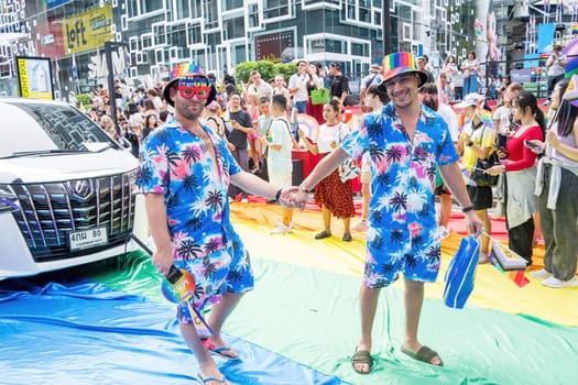 Bangkok, Thailand - JUN 1, 2024 Bangkok Pride Festival 2024, The short action and atmosphere of people joins celebrations in the event in Siam Square Bangkok, Thailand. Gender diversity There is no division of age, race or religion.