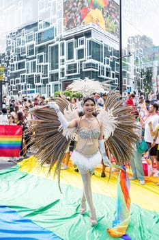 Bangkok, Thailand - JUN 1, 2024 Bangkok Pride Festival 2024, The short action and atmosphere of people joins celebrations in the event in Siam Square Bangkok, Thailand. Gender diversity There is no division of age, race or religion.