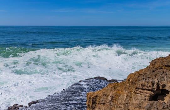 View of ocean waves and fantastic rocky coast in Ericeira, near Lisbon. Portugal