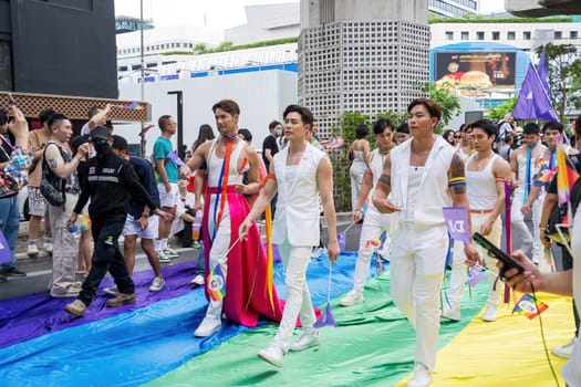 Bangkok, Thailand - JUN 1, 2024 Bangkok Pride Festival 2024, The short action and atmosphere of people joins celebrations in the event in Siam Square Bangkok, Thailand. Gender diversity There is no division of age, race or religion.