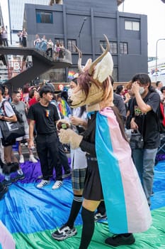 Bangkok, Thailand - JUN 1, 2024 Bangkok Pride Festival 2024, The short action and atmosphere of people joins celebrations in the event in Siam Square Bangkok, Thailand. Gender diversity There is no division of age, race or religion.