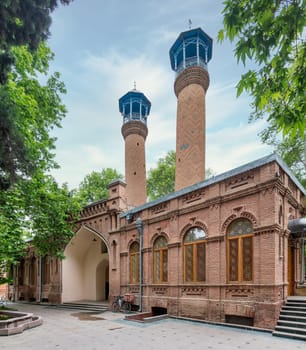 A view of the Juma Mosque of Ganja, Azerbaijan, with its two tall minarets and red bricks facade