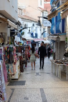 Torremolinos, Spain - September 19, 2023: View of a tourist shopping street inTorremolinos, Costa del Sol, Malaga Province, Spain