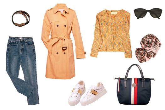 Collage set of woman spring summer clothes isolated. Female girls clothing collection. Women trench coat, jeans, jumper, sneaker, bag, accessories wear.