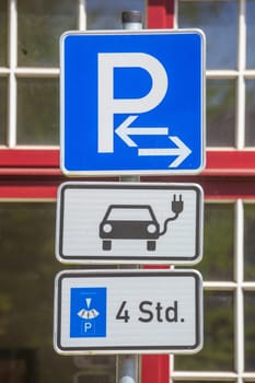 Traffic sign parking lot and charging station for electric cars, Germany