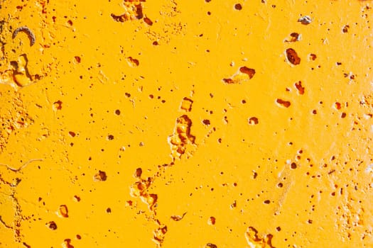 Orange painted porous metal surface, background, texture, Germany
