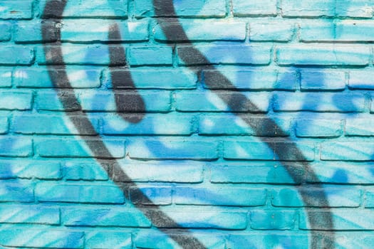 Blue painted brick wall as background, Germany
