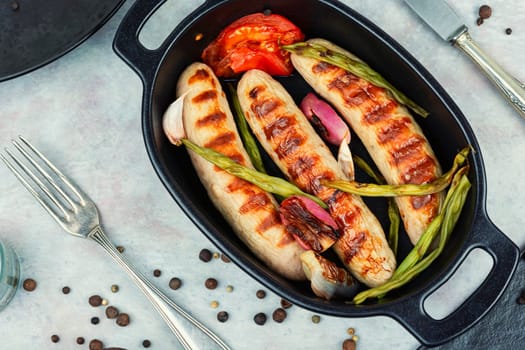 Pork barbecue sausages BBQ. German grilled sausages. Bratwurst.