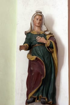 Virgin Mary, statue on the Main altar in Parish Church of  Saint Emeric in Kostel, Croatia