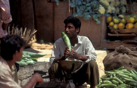 People at a Streetmarket and alley in the city of Chennai in Province Tamil Nadu in India.  India, Chennai, April, 1998