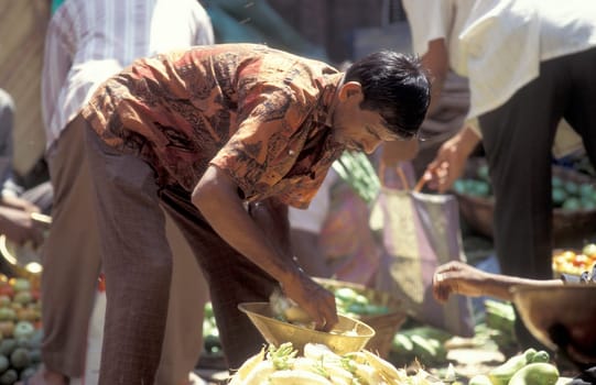 People at a Streetmarket and alley in the city of Chennai in Province Tamil Nadu in India.  India, Chennai, April, 1998