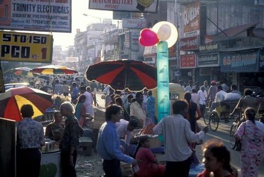 People at a Streetmarket and alley in the city of Chennai in Province Tamil Nadu in India.  India, Chennai, April, 1998