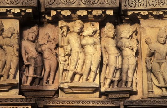 Erotic Sculptures at the erotic Temple or Hindu Temple of Kandarija Mahadeva Temple in the city of Khajurao in Province Madhya Pradesh in India.  India, Khajurao, April, 1998