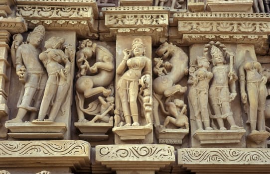 Erotic Sculptures at the erotic Temple or Hindu Temple of Kandarija Mahadeva Temple in the city of Khajurao in Province Madhya Pradesh in India.  India, Khajurao, April, 1998