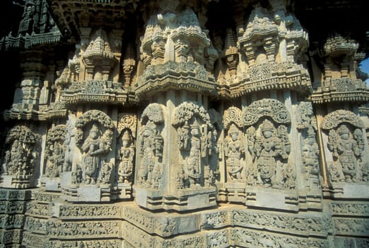 Erotic Sculptures at the erotic Temple or Hindu Temple of Kandarija Mahadeva Temple in the city of Khajurao in Province Madhya Pradesh in India.  India, Khajurao, April, 1998