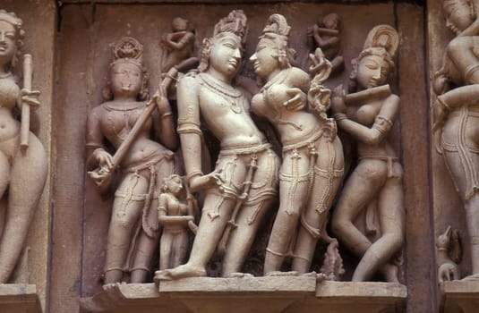 Erotic Sculptures at the erotic Temple or Hindu Temple of Kandarija Mahadeva Temple in the city of Khajurao in Province Madhya Pradesh in India.  India, Khajurao, April, 1998
