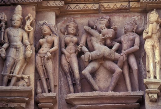 Erotic Sculptures at the erotic Temple or Hindu Temple of Kandarija Mahadeva Temple in the city of Khajurao in Province Madhya Pradesh in India.  India, Khajurao, April, 1998