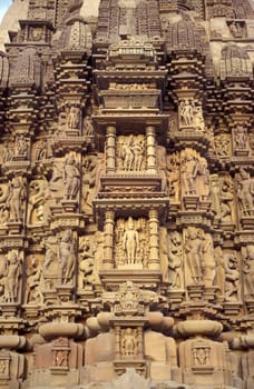 Erotic Sculptures at the erotic Temple or Hindu Temple of Kandarija Mahadeva Temple in the city of Khajurao in Province Madhya Pradesh in India.  India, Khajurao, April, 1998
