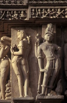 Erotic Sculptures at the erotic Temple or Hindu Temple of Kandarija Mahadeva Temple in the city of Khajurao in Province Madhya Pradesh in India.  India, Khajurao, April, 1998