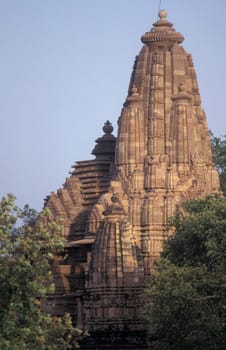 a view of the Erotic Temple and Hindu Temple of Kandarija Mahadeva Temple in the city of Khajurao in Province Madhya Pradesh in India.  India, Khajurao, April, 1998