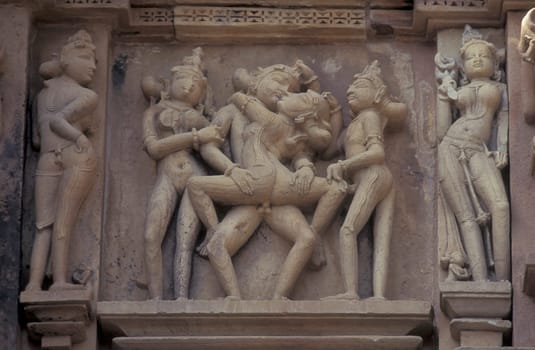 Erotic Sculptures at the erotic Temple or Hindu Temple of Kandarija Mahadeva Temple in the city of Khajurao in Province Madhya Pradesh in India.  India, Khajurao, April, 1998