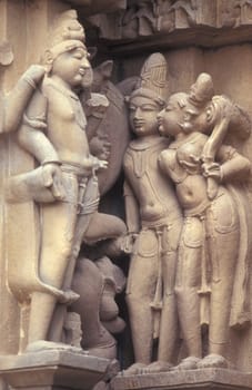 Erotic Sculptures at the erotic Temple or Hindu Temple of Kandarija Mahadeva Temple in the city of Khajurao in Province Madhya Pradesh in India.  India, Khajurao, April, 1998