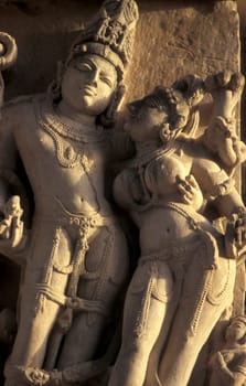 Erotic Sculptures at the erotic Temple or Hindu Temple of Kandarija Mahadeva Temple in the city of Khajurao in Province Madhya Pradesh in India.  India, Khajurao, April, 1998