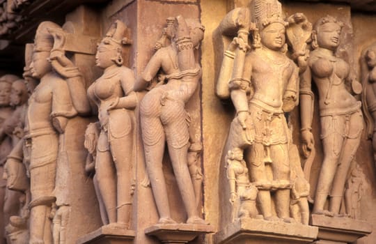 Erotic Sculptures at the erotic Temple or Hindu Temple of Kandarija Mahadeva Temple in the city of Khajurao in Province Madhya Pradesh in India.  India, Khajurao, April, 1998