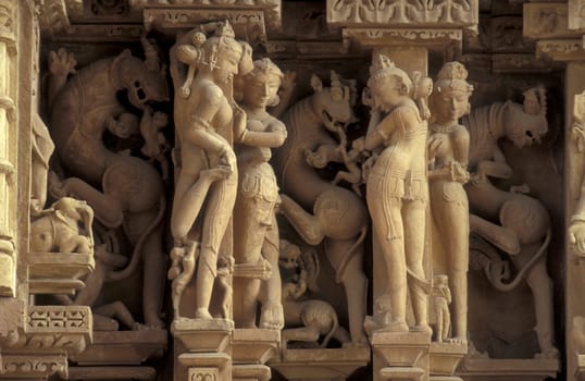 Erotic Sculptures at the erotic Temple or Hindu Temple of Kandarija Mahadeva Temple in the city of Khajurao in Province Madhya Pradesh in India.  India, Khajurao, April, 1998