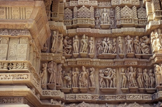 Erotic Sculptures at the erotic Temple or Hindu Temple of Kandarija Mahadeva Temple in the city of Khajurao in Province Madhya Pradesh in India.  India, Khajurao, April, 1998