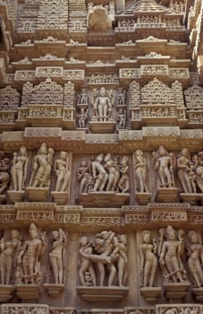 Erotic Sculptures at the erotic Temple or Hindu Temple of Kandarija Mahadeva Temple in the city of Khajurao in Province Madhya Pradesh in India.  India, Khajurao, April, 1998