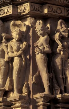 Erotic Sculptures at the erotic Temple or Hindu Temple of Kandarija Mahadeva Temple in the city of Khajurao in Province Madhya Pradesh in India.  India, Khajurao, April, 1998