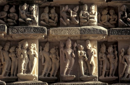 Erotic Sculptures at the erotic Temple or Hindu Temple of Kandarija Mahadeva Temple in the city of Khajurao in Province Madhya Pradesh in India.  India, Khajurao, April, 1998