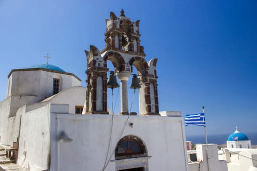 White church in Pyrgos town on Santorini island, Greece