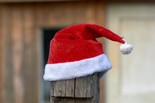 santa Claus hat is put on a pole. High quality photo