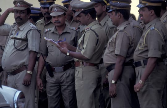 Indian Police men in the city of Kochi or Cochin in the Province Kerala in India.  India, Cochin, April, 1998